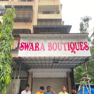 Swara Boutiques shop signage board installed on storefront for branding