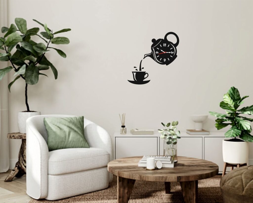 Tea time designer wall clock shaped like a teapot pouring into a cup in a modern living room setting