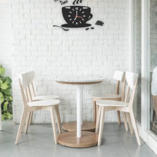 Coffee-themed designer wall clock hanging on a café-style wall