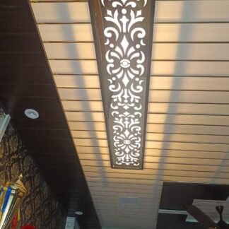 Acrylic ceiling jali panel installed in a modern home interior with illuminated decorative cutwork design