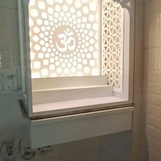 Acrylic Mandir Jali with illuminated Om mandala design and floral side panels in a modern home temple